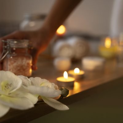 woman taking bath salt put some water before taking bath